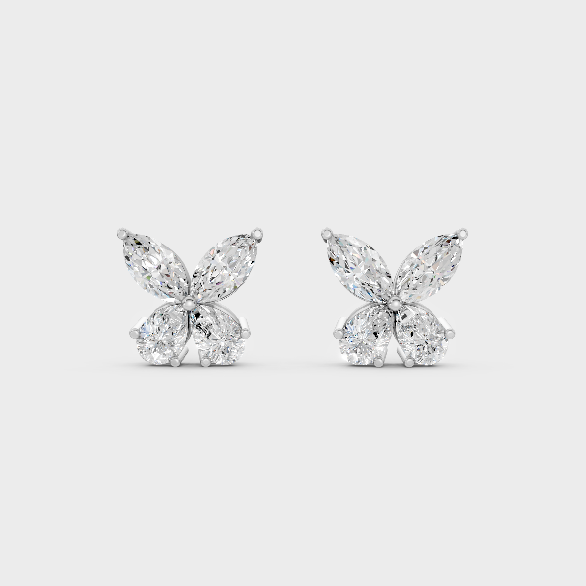 On-ear perspective highlighting the icy Brilliant Sparkle of 1.74ct White Gold Marquise Pear Diamond Studs.