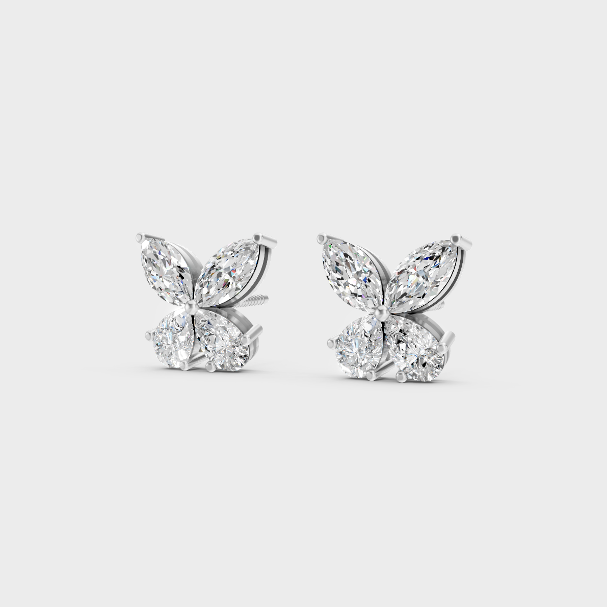 Precise prong placement securing brilliant stones on 950 Platinum Marquise and Pear Lab Diamond Stud Earrings.