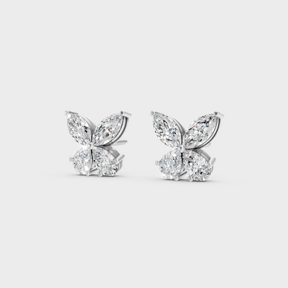 Precise prong placement securing brilliant stones on 950 Platinum Marquise and Pear Lab Diamond Stud Earrings.