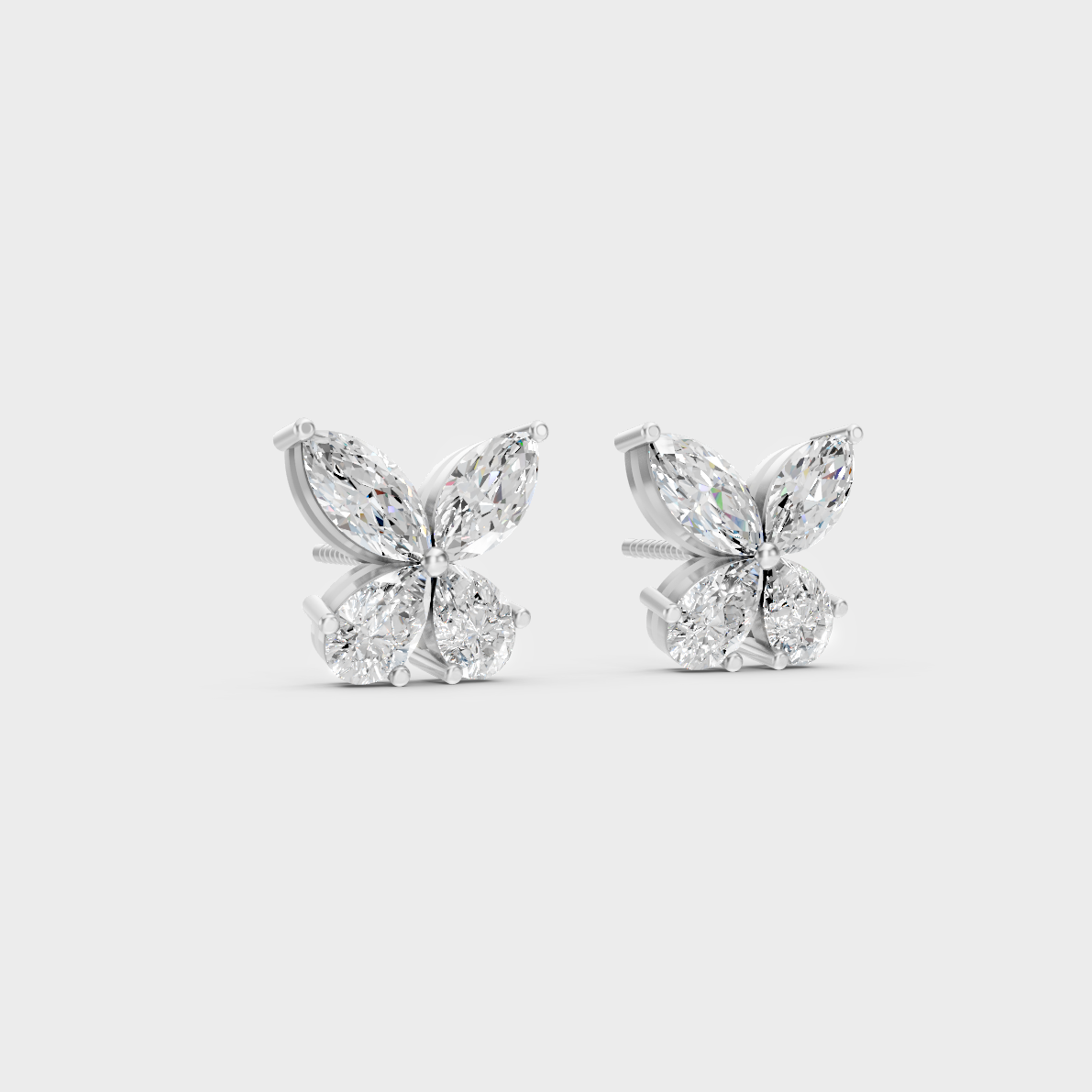 Frontal view of Ethical Luxury Studs featuring Marquise and Pear Cut Lab Diamonds set in 14K White Gold.