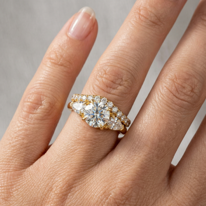 Gold and diamond ring on a hand 