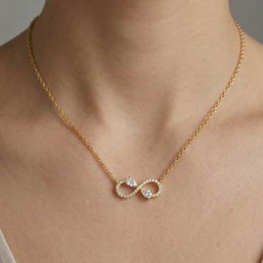 Classic 14K Yellow Gold Infinity Necklace Featuring A Pear Lab Diamond