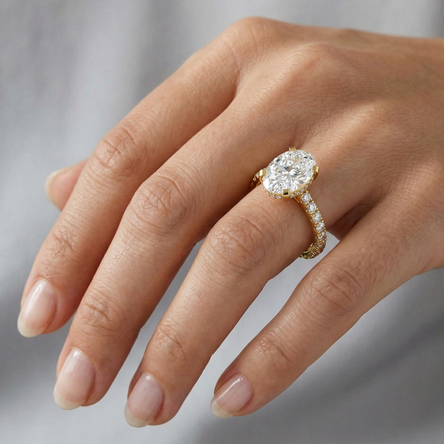 Yellow Gold Engagement Ring Featuring A 1.19Ct Oval Lab Diamond