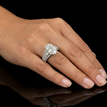 Platinum Oval And Round Cut Diamond Ring Timeless Design