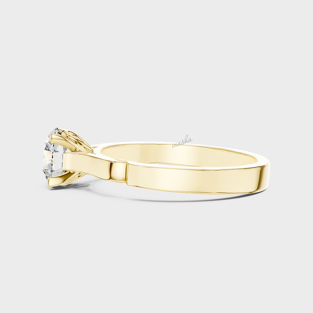 Round cut lab grown diamond ring in gold