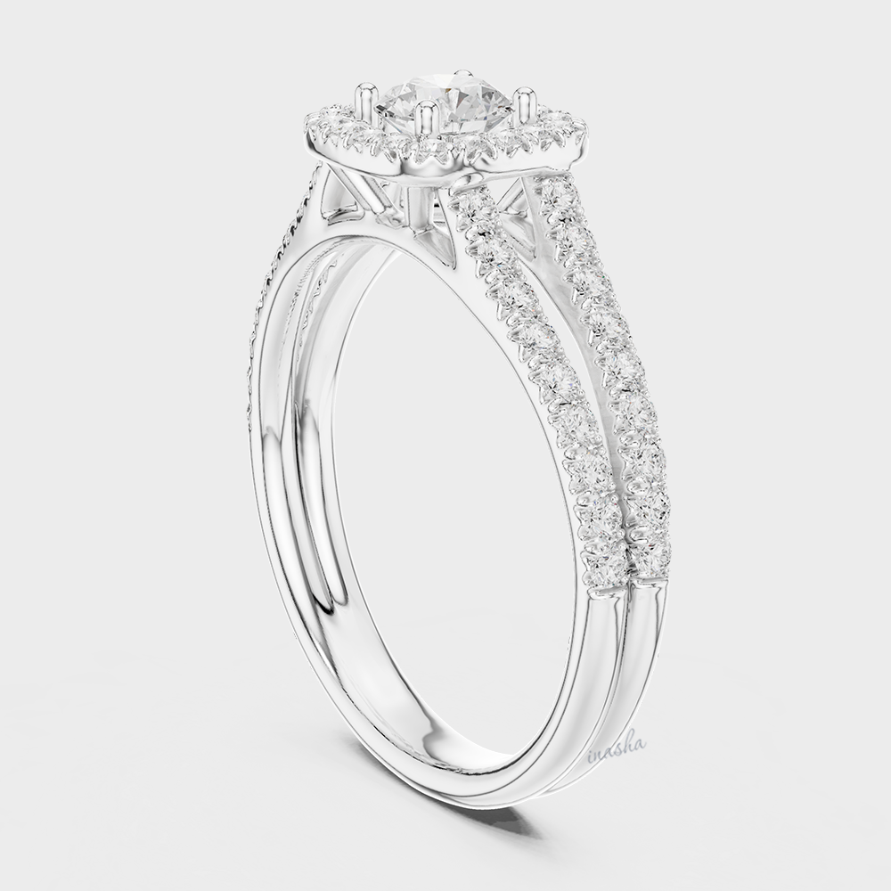 Round Cut Diamond ring with a white gold band 