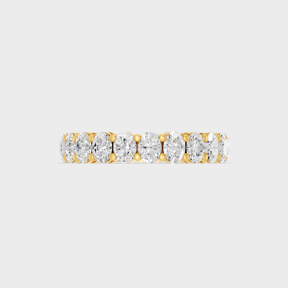 Elegant Oval Diamond Eternity Band In Yellow Gold