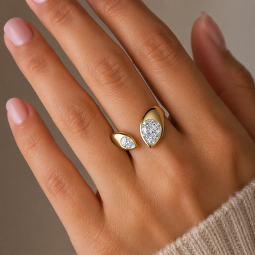 yellow gold solitaire showcasing a teardrop-shaped lab diamond