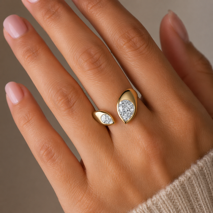 yellow gold solitaire showcasing a teardrop-shaped lab diamond