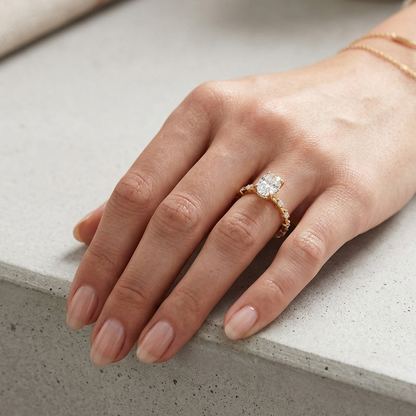  Luxury yellow gold solitaire showcasing a oval and round-cut lab diamond