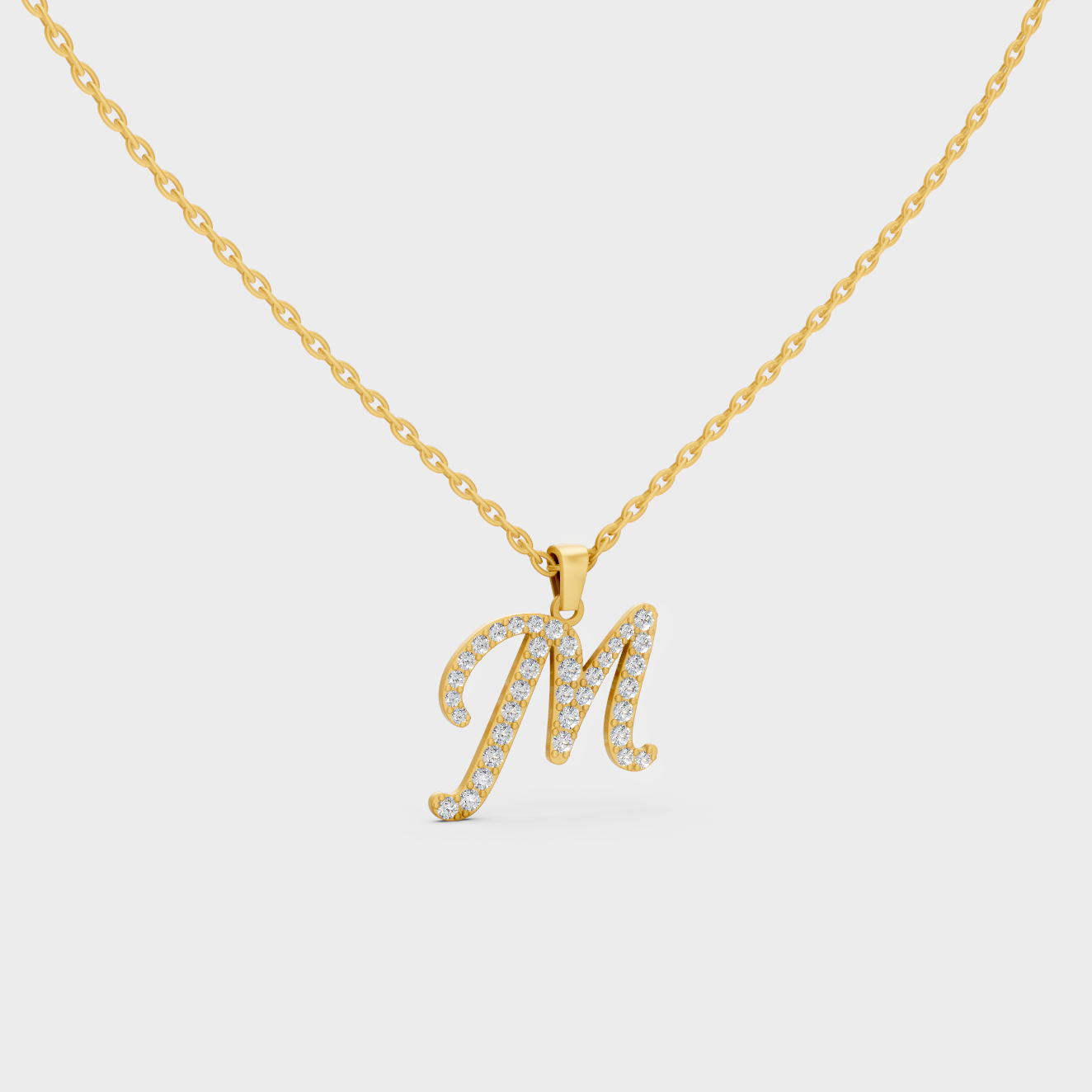 Close Up of Initial Letter M Sustainable Diamond Pendant and 18K Yellow Gold Chain