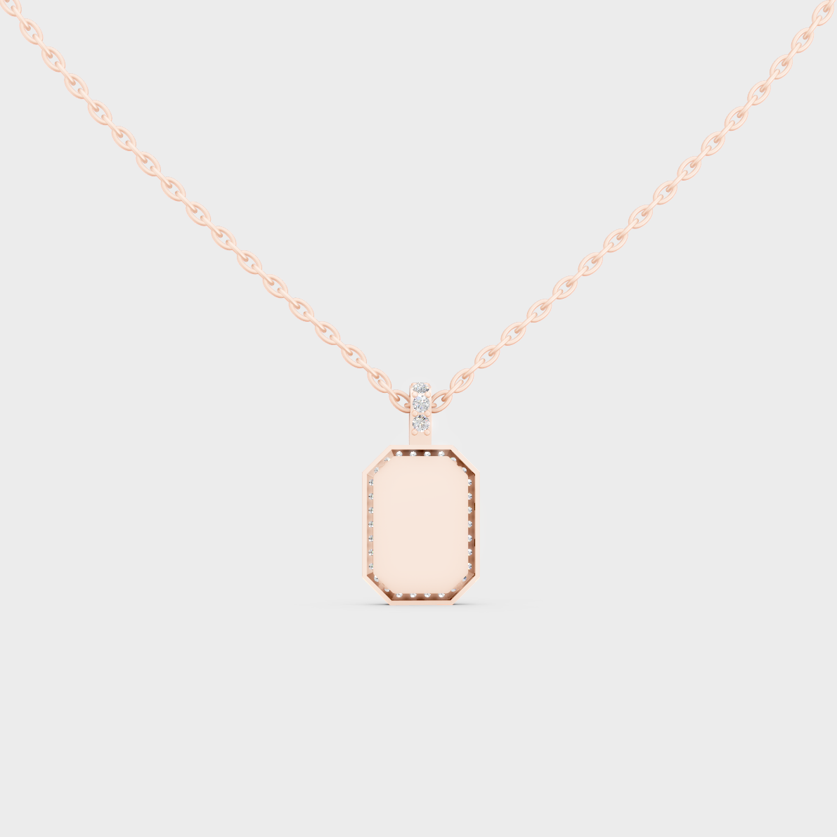 Detailed Close Up of Delicate "Q" Initial Diamond Charm Handcrafted in 9K Rose Gold