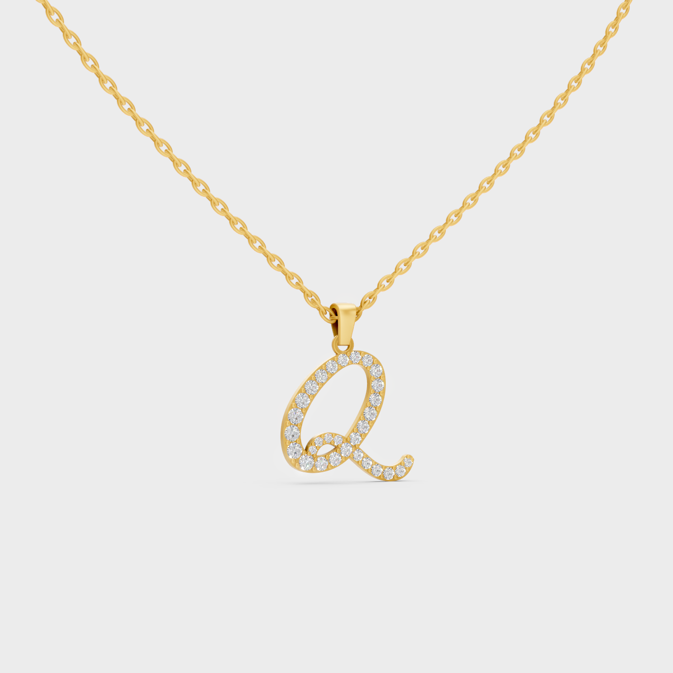 Close Up of Initial Letter Q Sustainable Diamond Pendant and 18K Yellow Gold Chain