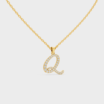 Close Up of Initial Letter Q Sustainable Diamond Pendant and 18K Yellow Gold Chain