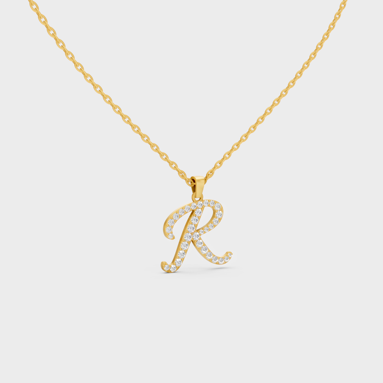 Close Up of Initial Letter R Sustainable Diamond Pendant and 18K Yellow Gold Chain