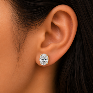 Oval Cut Lab Grown Diamond Earrings In 14K Yellow Gold 