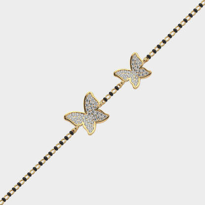 Classic yellow gold Mangalsutra bracelet featuring a round lab diamond