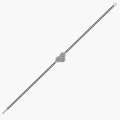 Sleek white gold Mangalsutra featuring a Gli certified round lab diamond