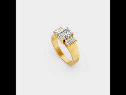 Discover ethical luxury with our Certified 2.2 Carat Emerald and Baguette-Cut Lab-Grown Diamond Three-Stone Ring. Expertly crafted in Gold or Platinum.