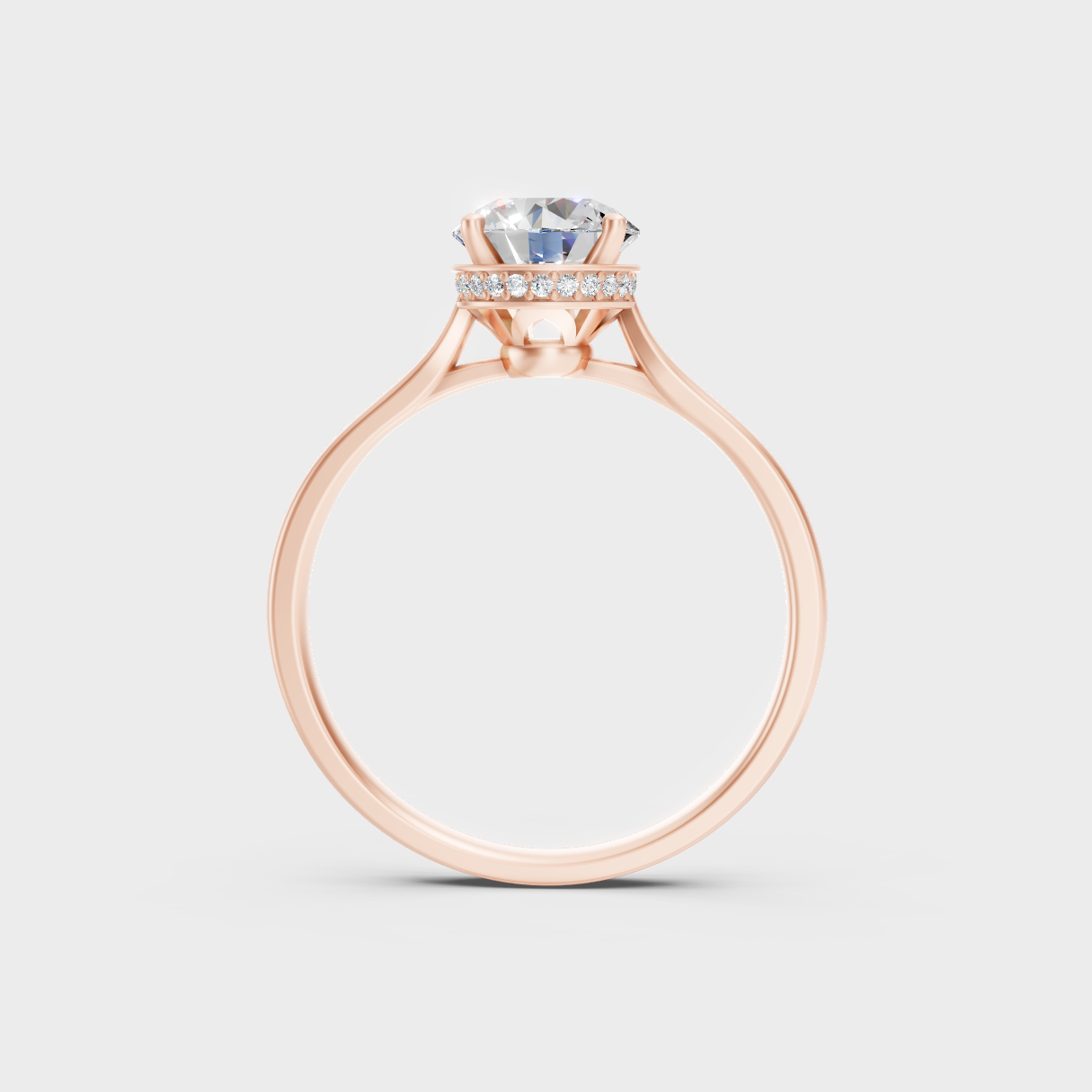 Modern Rose Gold Engagement Ring With A Brilliant Sustainable Diamond And Secret Halo