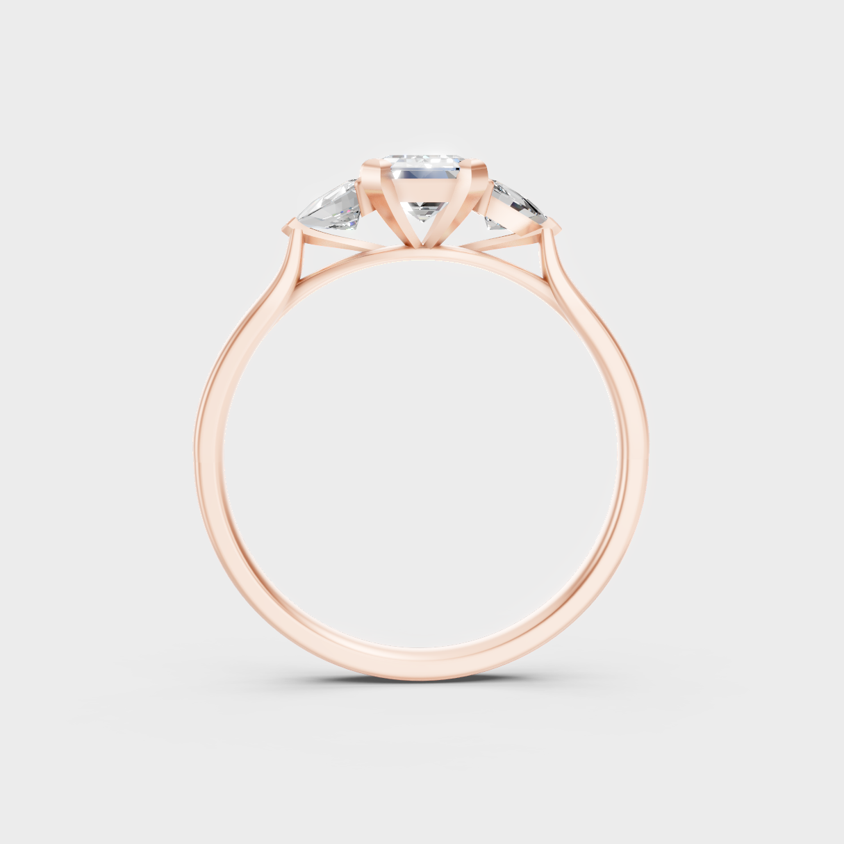 Unique Rose Gold Ring Featuring A Igi Certified Emerald Cut And Trillion Side Stones