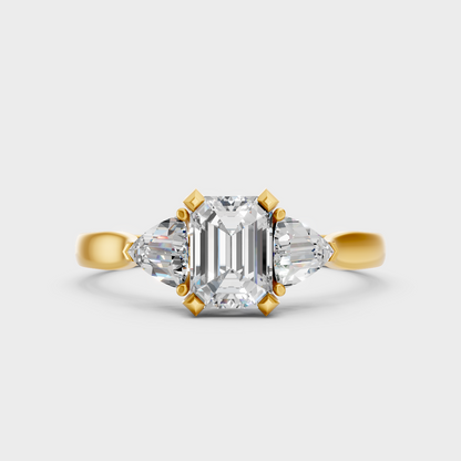 Classic Yellow Gold Three-Stone Engagement Ring Featuring An Emerald Cut And Trillions