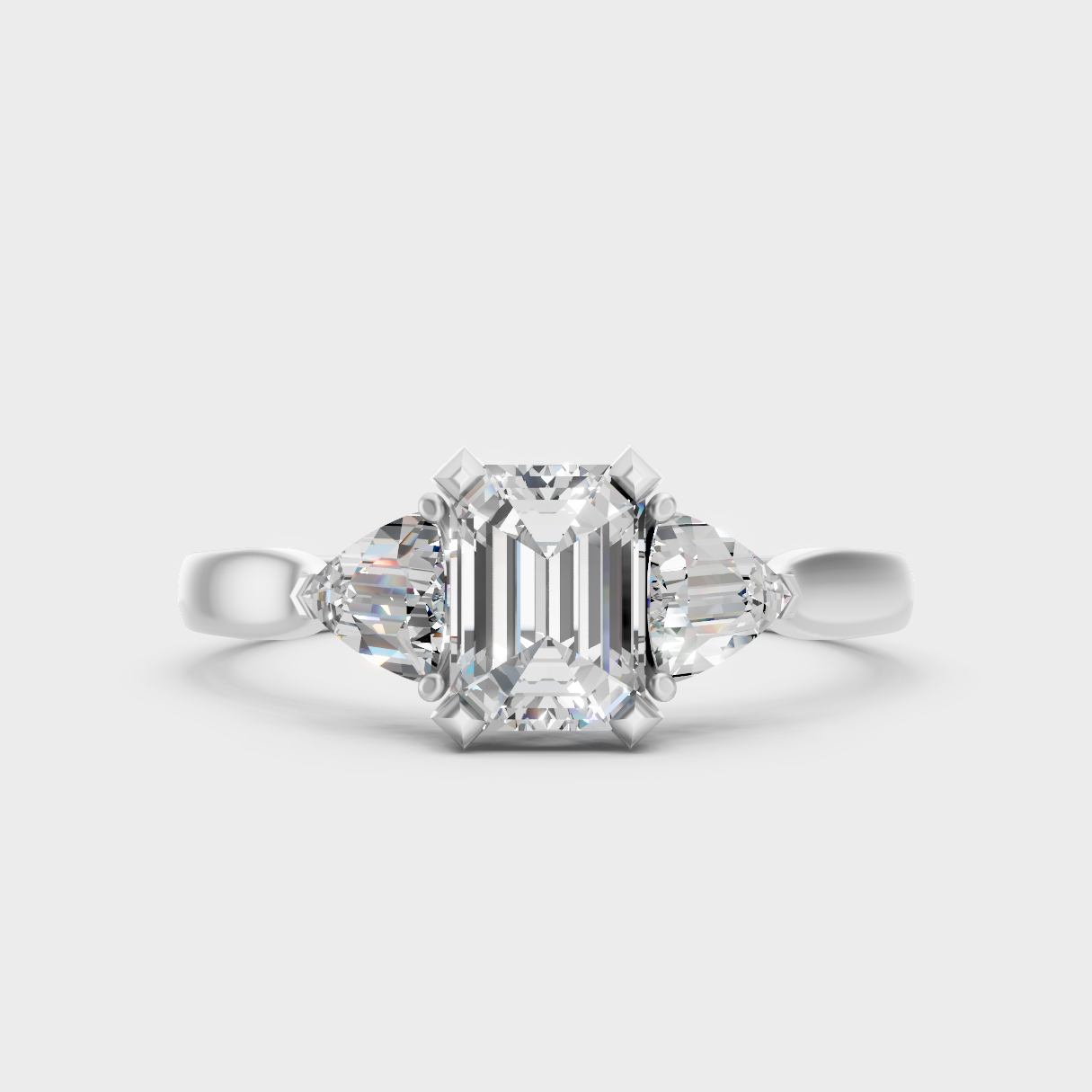 Sleek White Gold Three-Stone Ring Featuring A Igi Certified Emerald-Cut Diamond