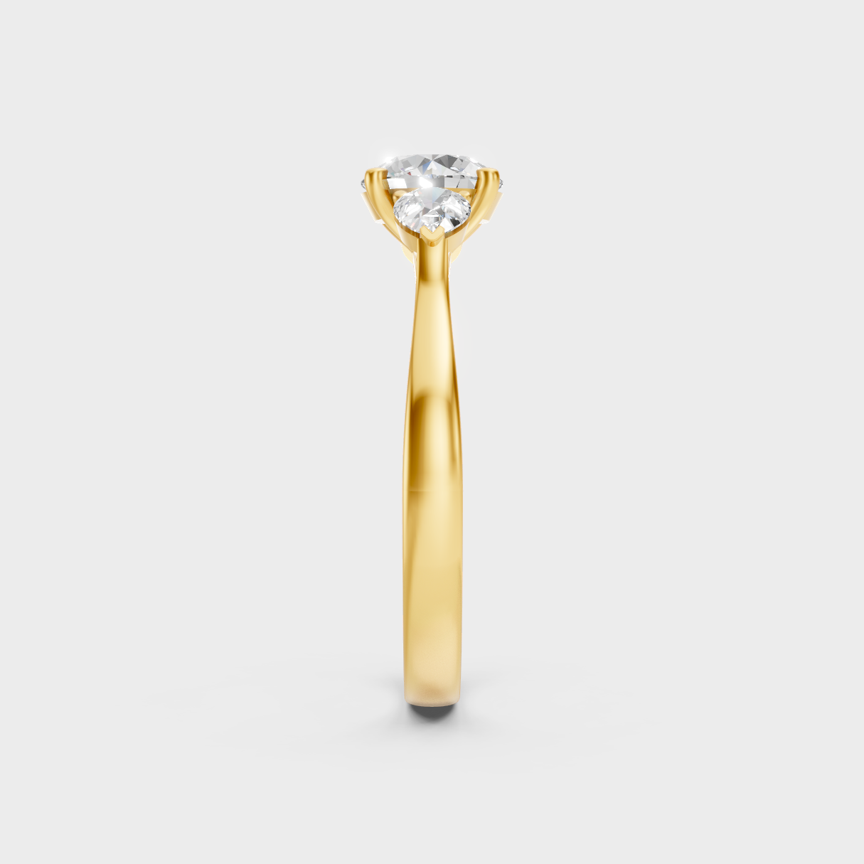 Radiant Yellow Gold Statement Ring With IGI Certified Round And Pear-Cut Trio