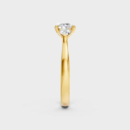 Radiant Yellow Gold Statement Ring With IGI Certified Round And Pear-Cut Trio