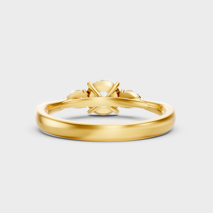 Customizable Yellow Gold Three-Stone Ring Featuring Sustainable Round And Pear Diamond