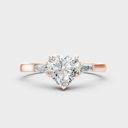 Unique Rose Gold Ring Featuring A Igi Certified Heart-Cut And Baguette Side Stones