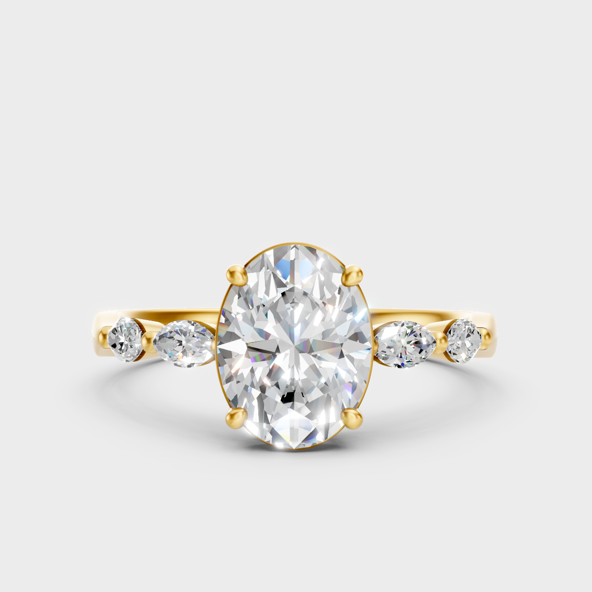 Classic Yellow Gold Three-Stone Engagement Ring Featuring A Oval And Marquises