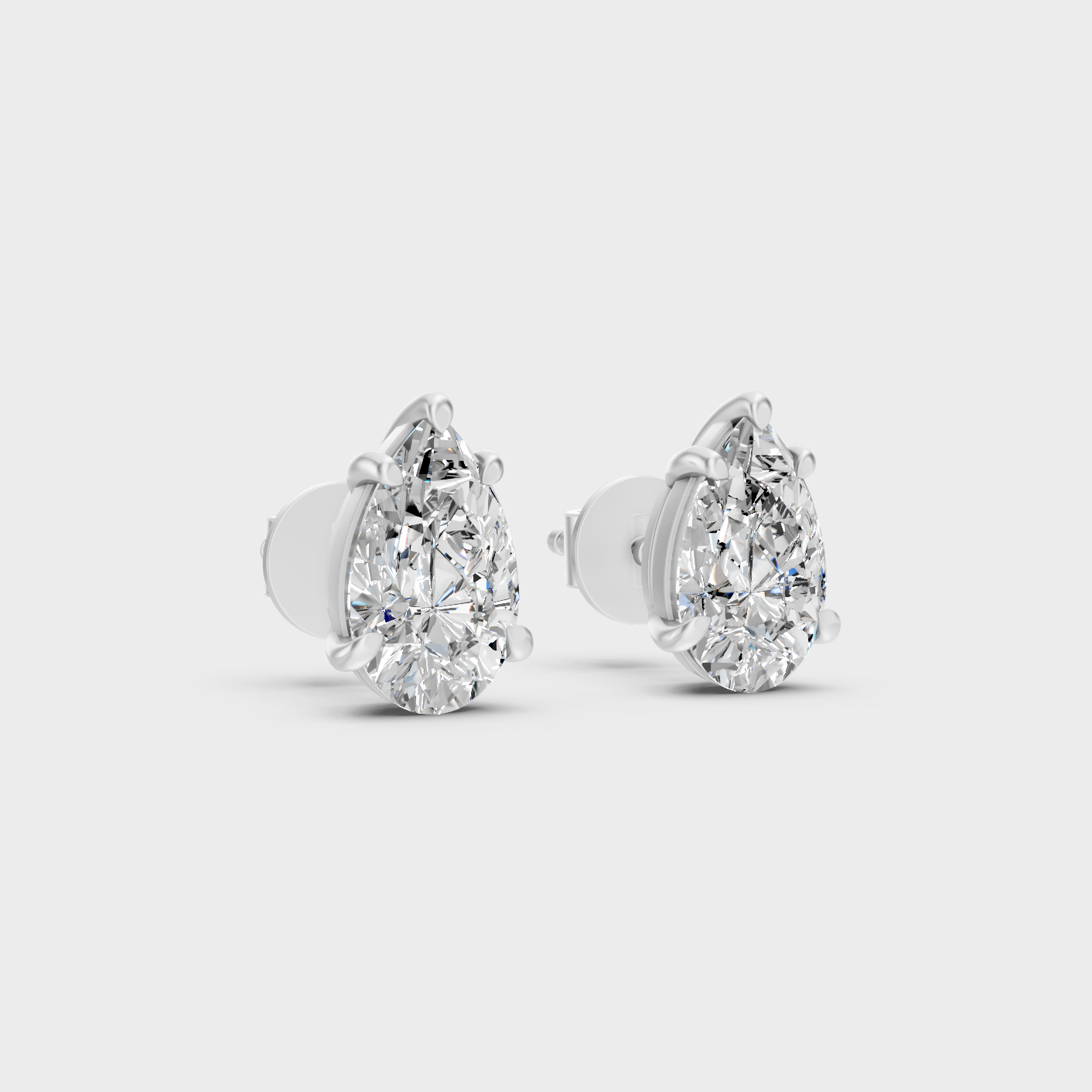Platinum Pear Diamond Stud Earrings For Timeless Sophistication