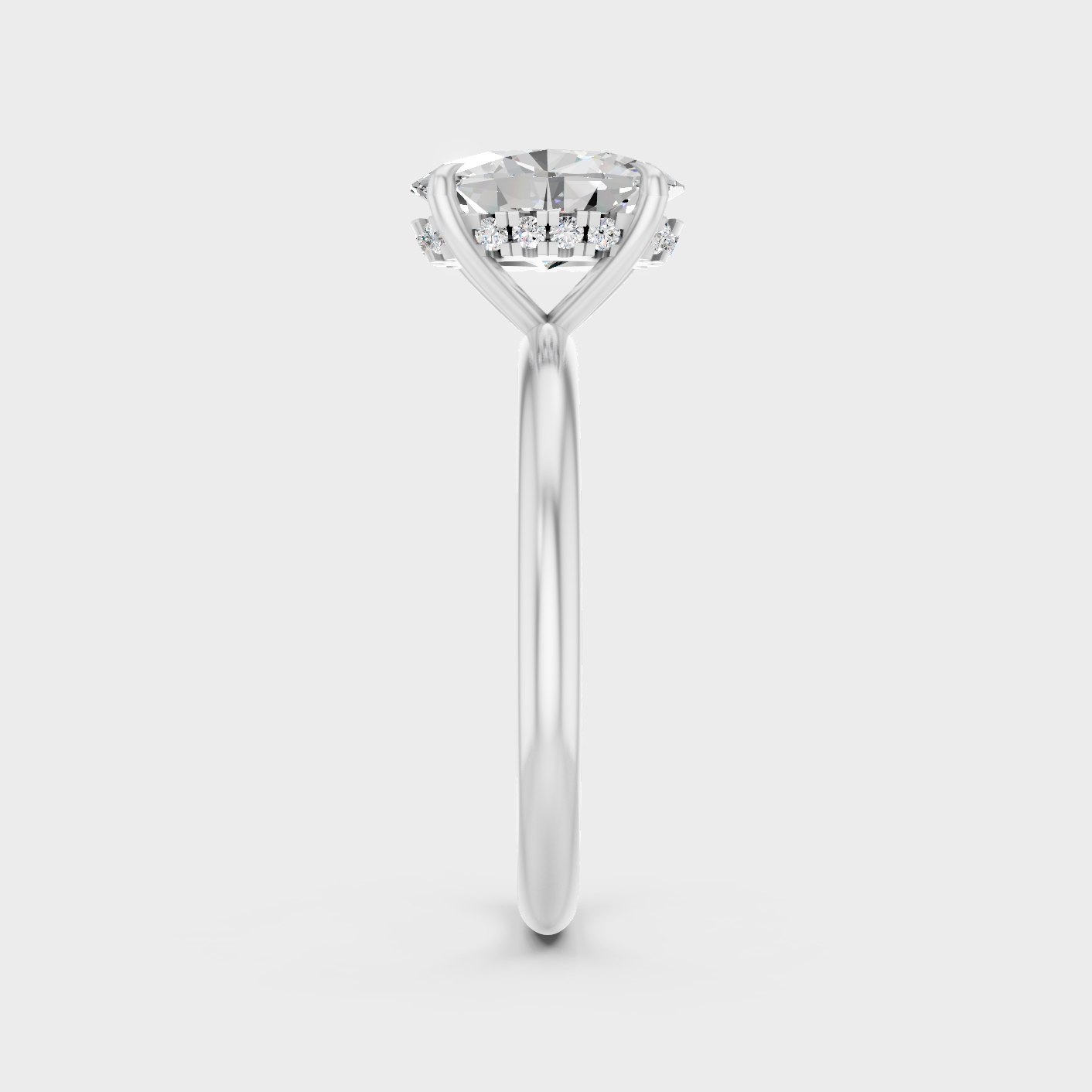 White Gold Oval Diamond Proposal Ring With Hidden Halo Design