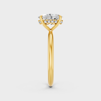 Elegant Oval Hidden Halo Diamond Ring In Yellow Gold