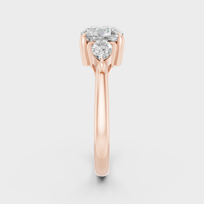 Three Stone Ring In Rose Gold With Cushion And Pear Diamonds