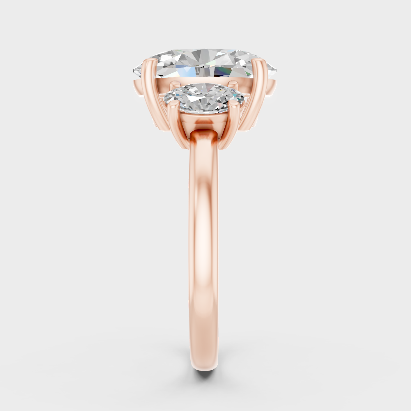 Three Stone Ring In Rose Gold With Oval Diamonds