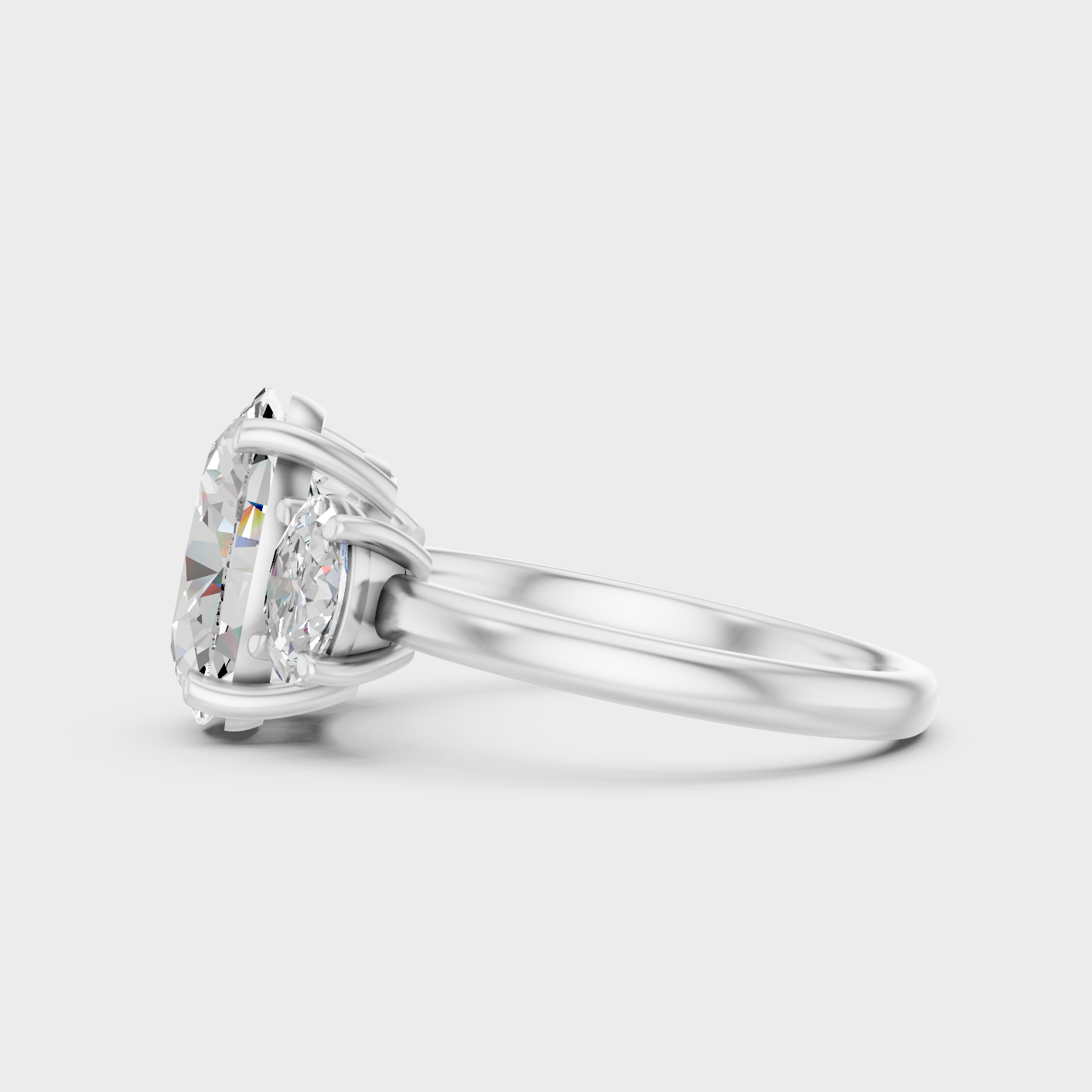 White Gold Oval Diamond Ring With Three Stone Design