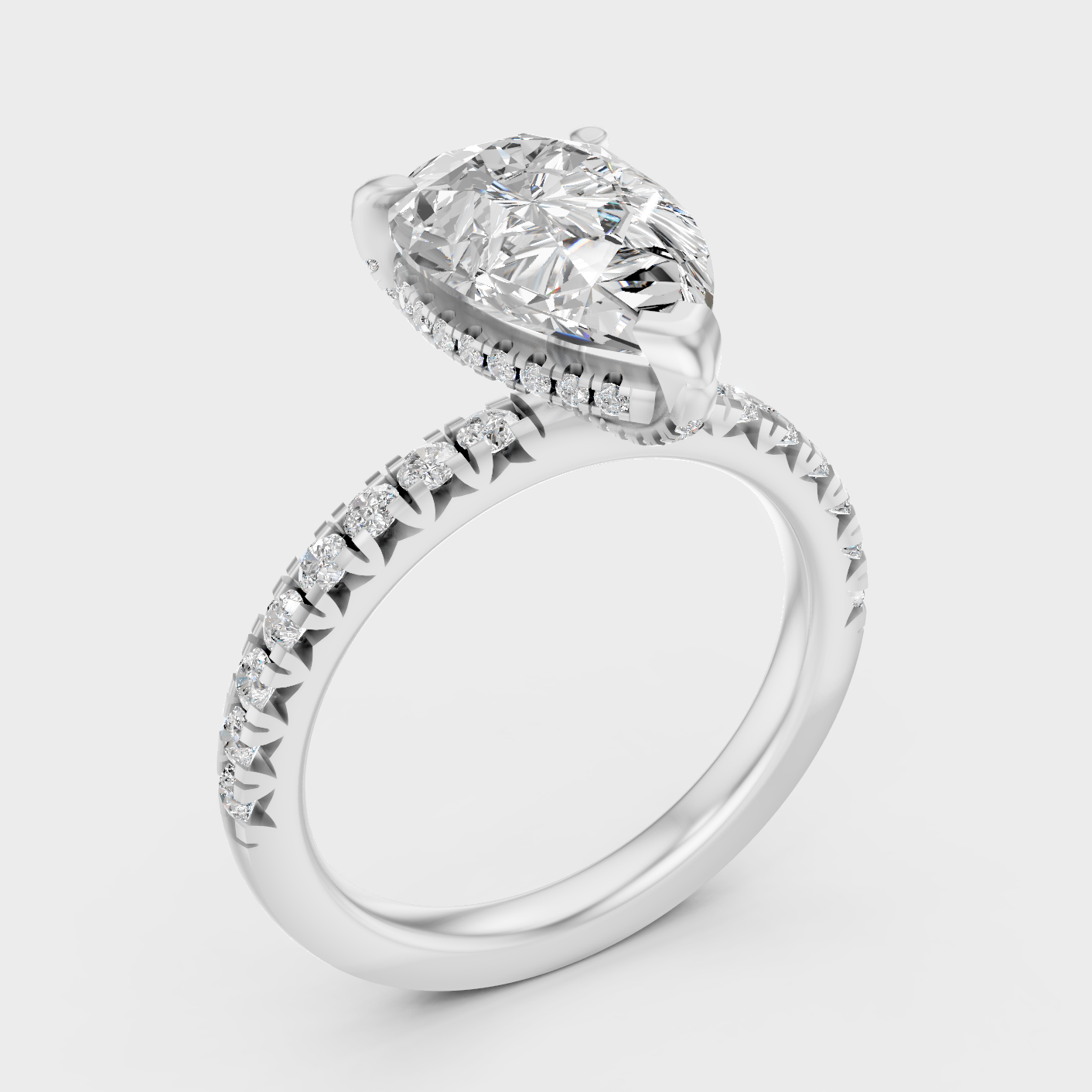 Platinum Pear Cut Diamond Halo Ring With Brilliant Round Accents