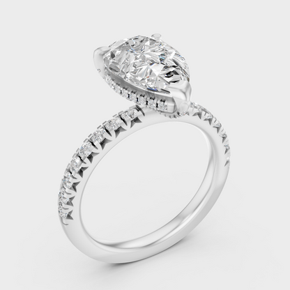 Platinum Pear Cut Diamond Halo Ring With Brilliant Round Accents