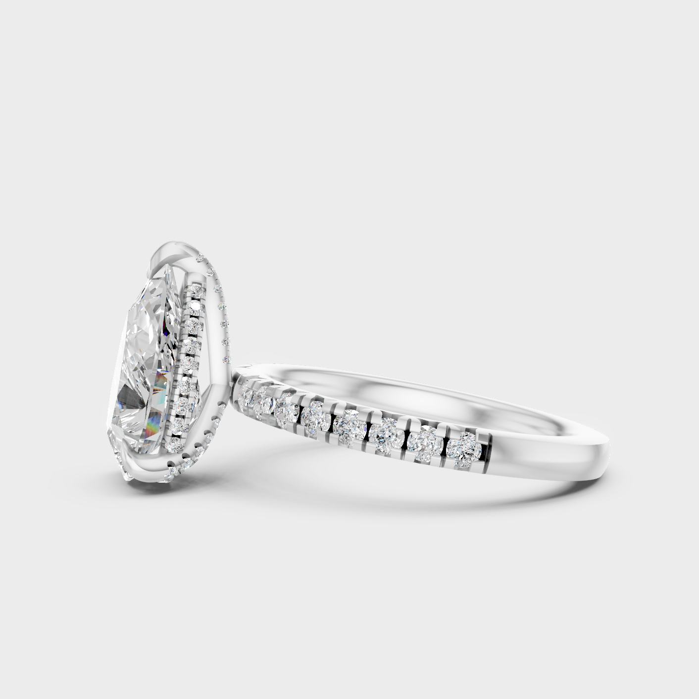 White Gold Pear Diamond Ring With Accent Stones Elegant Style