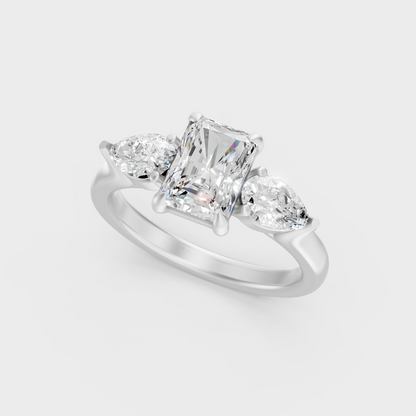 Platinum Radiant And Pear Cut Three Stone Ring Timeless Elegance