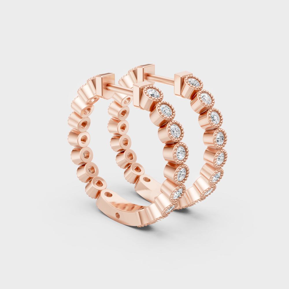 Modern rose gold and round-cut diamond hoop earrings for ethical luxury.