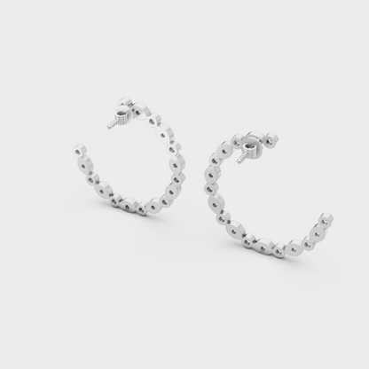 High-polish 950 platinum diamond hoops featuring round-cut brilliant stones