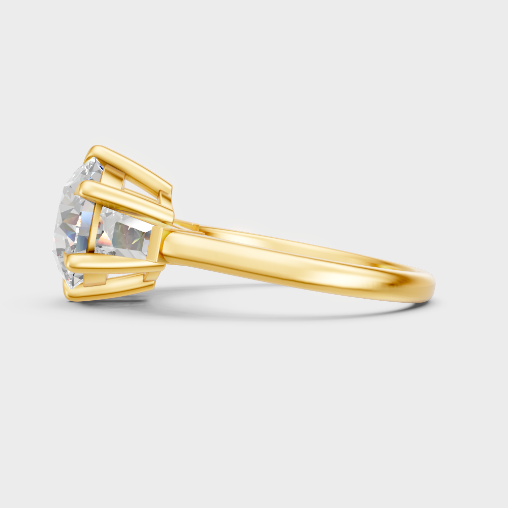 Sustainable yellow gold trio solitaire ring featuring GLI-certified lab-grown diamonds