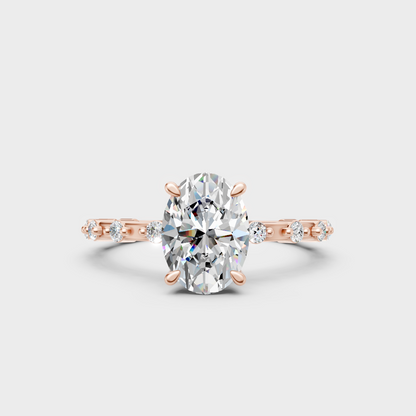 Romantic rose gold engagement ring with a oval and round-cut lab diamond