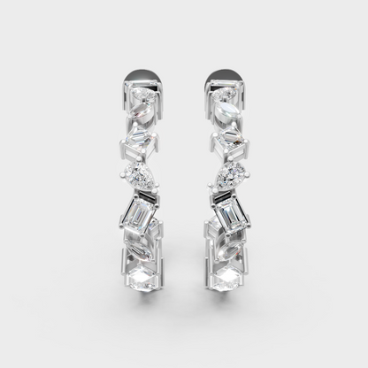 Sleek white gold mixed-cut diamond hoops for high-end ethical luxury