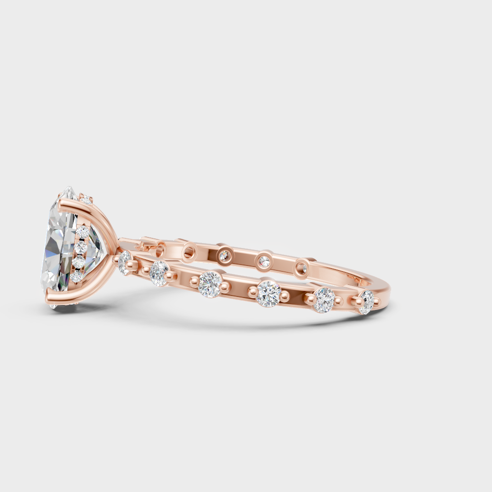 Blush rose gold engagement ring with hallmarked oval and round lab diamonds