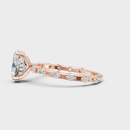 Blush rose gold engagement ring with hallmarked oval and round lab diamonds