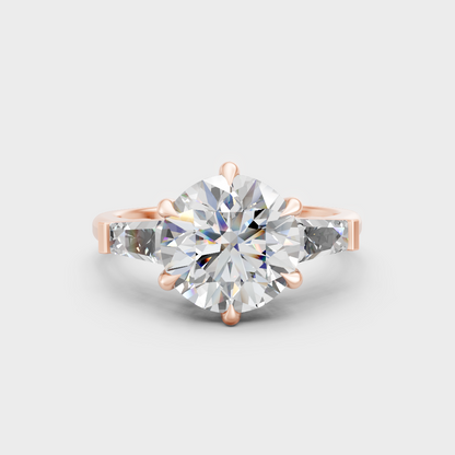 Romantic rose gold trio engagement ring with round and baguette lab-grown diamonds